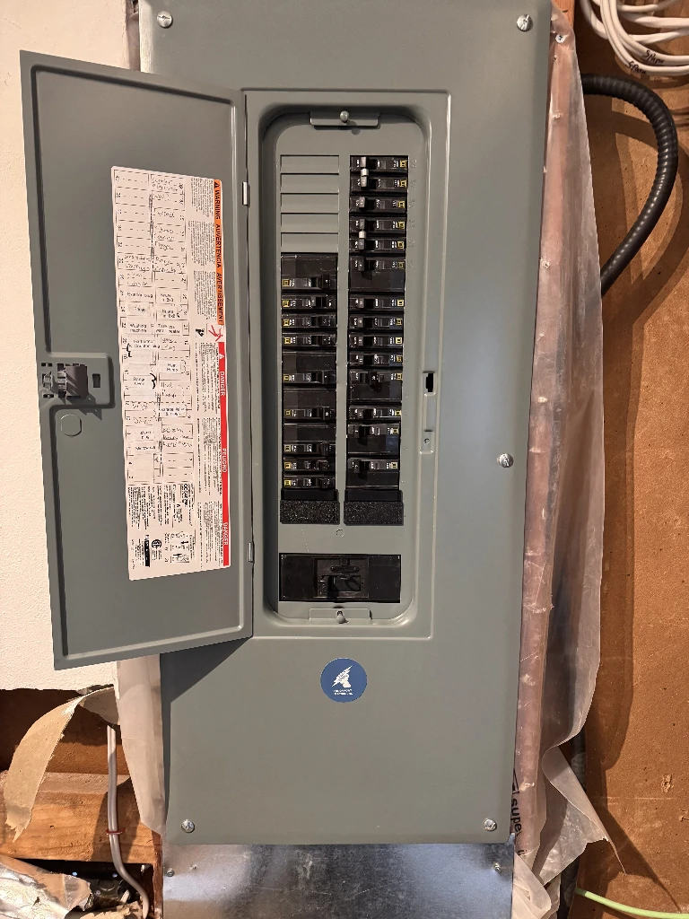 Licensed electrician completing electrical installation